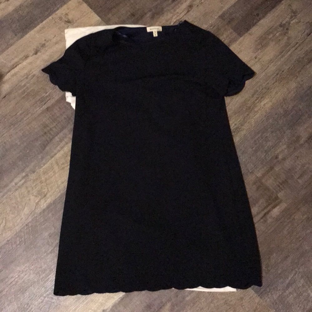 Navy Dress with scalloping on arms and the bottom